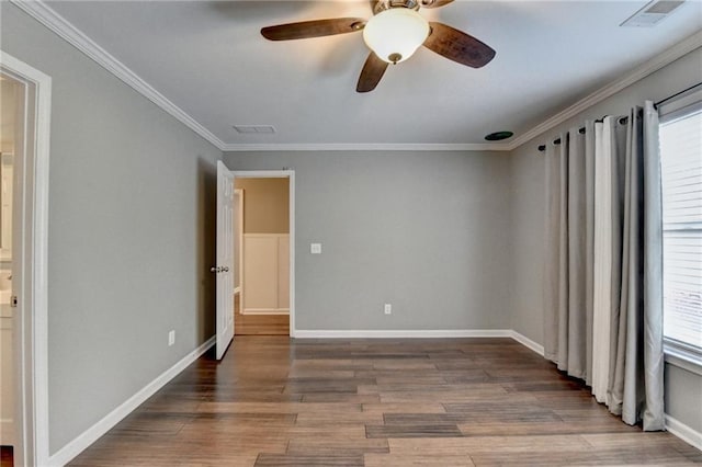 4770 Spring Park Cir, Suwanee, GA 30024 - spare room with wood finished floors, ornamental molding, and a ceiling fan