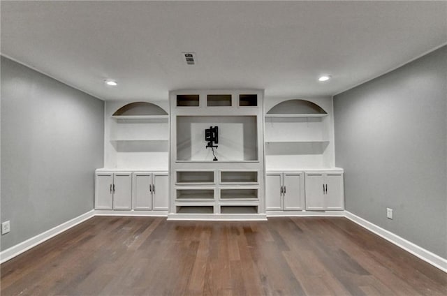 4770 Spring Park Cir, Suwanee, GA 30024 - unfurnished dining area with dark wood-type flooring, built in features, and recessed lighting