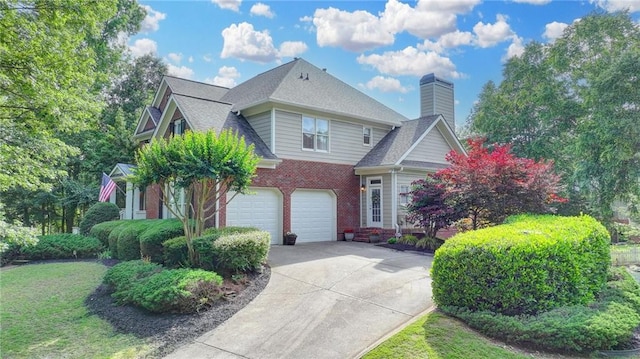 4770 Spring Park Cir, Suwanee, GA 30024 - traditional-style home with brick siding, concrete driveway, a garage, a shingled roof, and a chimney