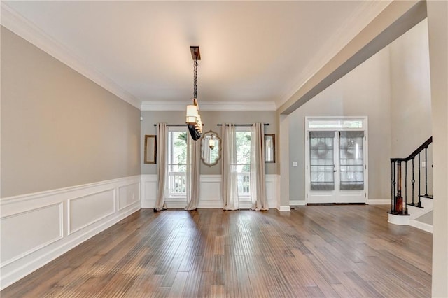 4770 Spring Park Cir, Suwanee, GA 30024 - entrance foyer featuring stairs, a chandelier, dark wood finished floors, wainscoting, and crown molding