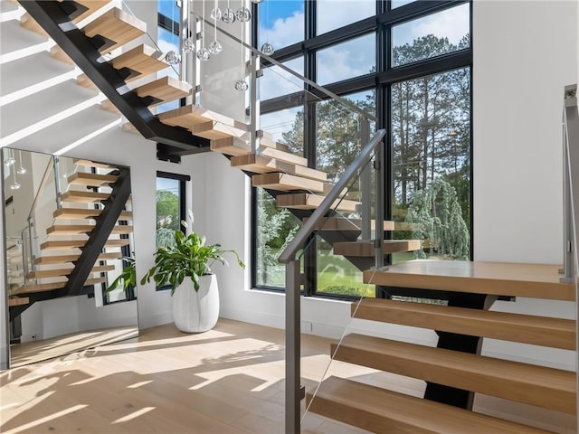 2940 Old Peachtree Rd, Dacula, GA 30019 - stairs with wood finished floors and baseboards