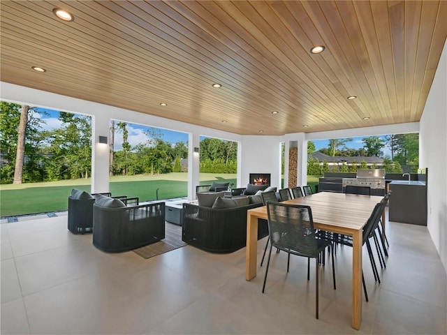 2940 Old Peachtree Rd, Dacula, GA 30019 - view of patio / terrace with area for grilling, grilling area, an outdoor living space with a fireplace, and outdoor dining area