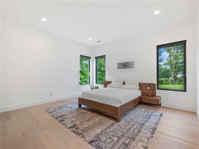 2940 Old Peachtree Rd, Dacula, GA 30019 - bedroom featuring recessed lighting, baseboards, and light wood-style flooring