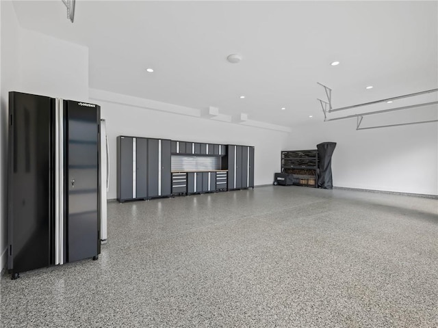 2940 Old Peachtree Rd, Dacula, GA 30019 - garage with freestanding refrigerator and recessed lighting