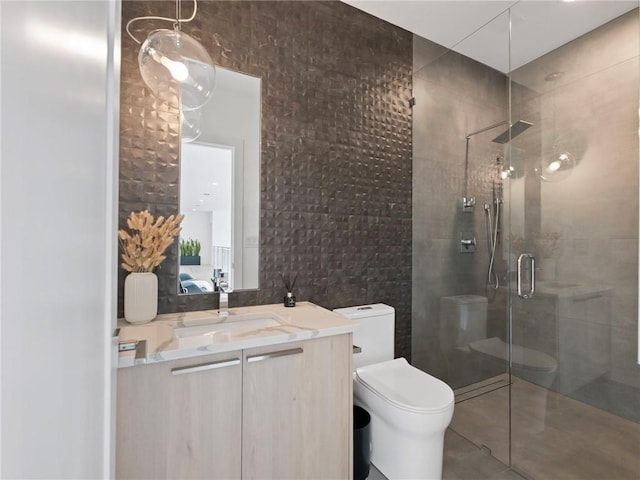 2940 Old Peachtree Rd, Dacula, GA 30019 - bathroom featuring toilet, a shower stall, tile walls, vanity, and tile patterned flooring