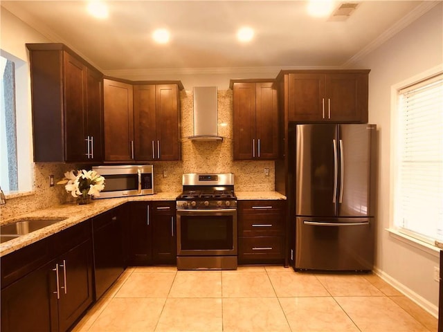 4645 Valais Ct Unit 10, Johns Creek, GA 30022 - kitchen featuring appliances with stainless steel finishes, wall chimney exhaust hood, ornamental molding, decorative backsplash, and healthy amount of natural light