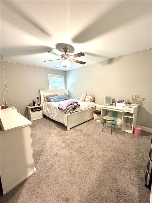 bedroom with carpet floors and ceiling fan