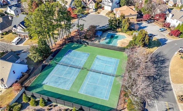 birds eye view of property with a residential view