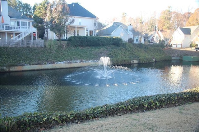 view of water feature with a residential view