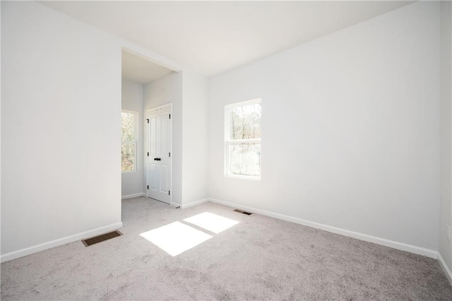 1005 Sims Ave NW, Atlanta, GA 30318 - carpeted empty room featuring baseboards and visible vents