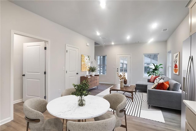 1005 Sims Ave NW, Atlanta, GA 30318 - dining area with baseboards, recessed lighting, and light wood-type flooring