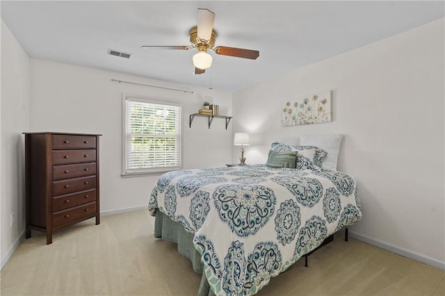 bedroom featuring baseboards, carpet, and ceiling fan