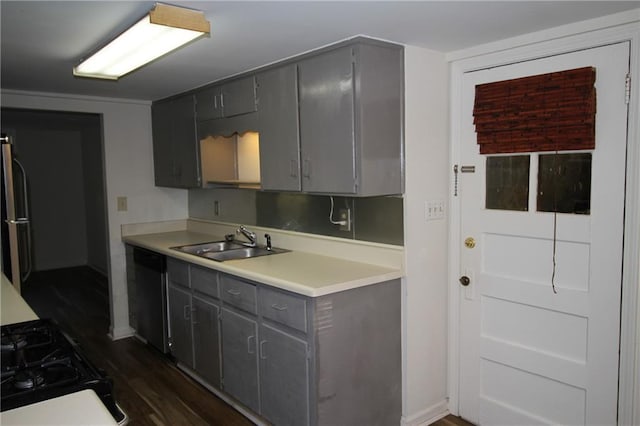 2054 E Roxboro Rd NE, Atlanta, GA 30324 - kitchen featuring light countertops, gray cabinets, dark wood finished floors, stainless steel dishwasher, and a sink