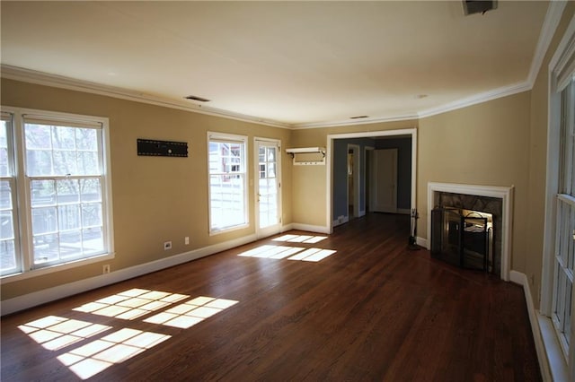 2054 E Roxboro Rd NE, Atlanta, GA 30324 - unfurnished living room with crown molding, baseboards, visible vents, a fireplace, and wood finished floors