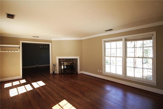 2054 E Roxboro Rd NE, Atlanta, GA 30324 - unfurnished living room featuring wood finished floors, crown molding, a premium fireplace, and visible vents