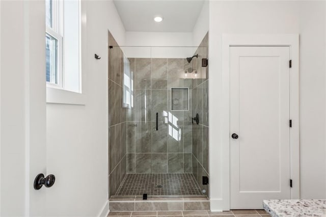 bathroom featuring a stall shower