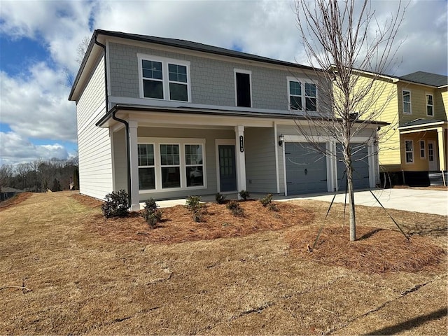 view of front facade featuring a garage and a front yard