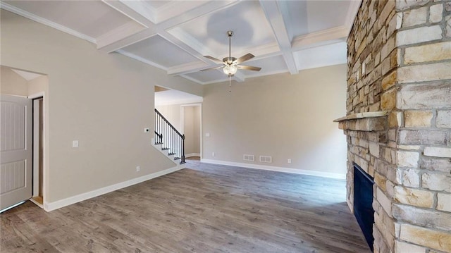 113 Cherokee Estates Dr, Cedartown, GA 30125 - unfurnished living room featuring stairway, ceiling fan, coffered ceiling, beamed ceiling, and a fireplace
