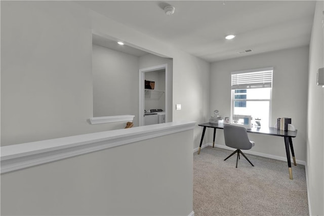 office space with light carpet, visible vents, baseboards, washing machine and clothes dryer, and recessed lighting