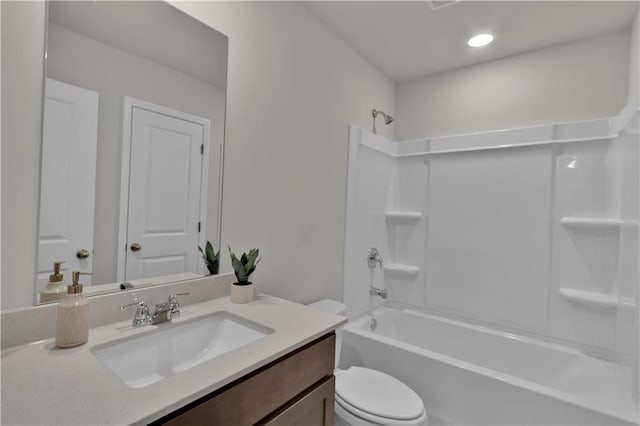 full bathroom with toilet, shower / washtub combination, and vanity