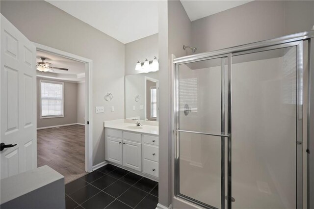 274 Sleepy Hollow Rd, Powder Springs, GA 30127 - bathroom with vanity, a ceiling fan, tile patterned floors, and a shower stall