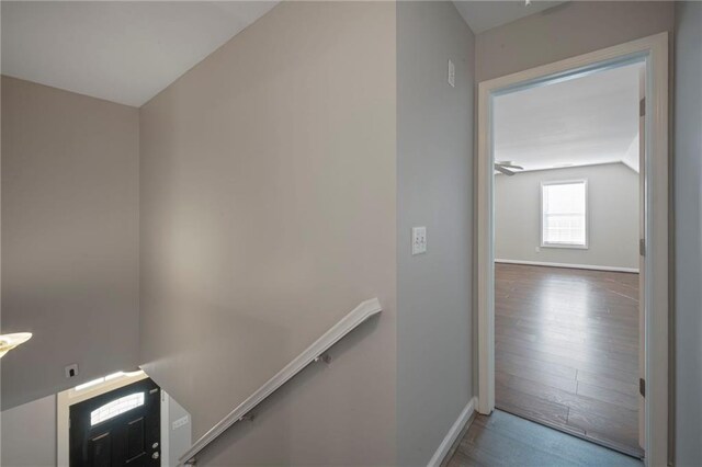 274 Sleepy Hollow Rd, Powder Springs, GA 30127 - stairs with baseboards, vaulted ceiling, and wood finished floors