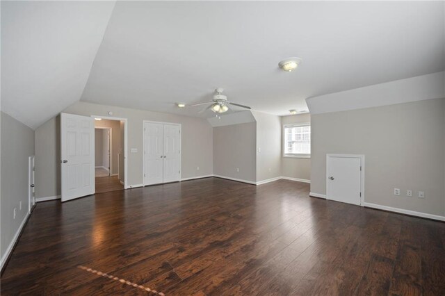 274 Sleepy Hollow Rd, Powder Springs, GA 30127 - additional living space featuring dark wood finished floors, baseboards, vaulted ceiling, and ceiling fan