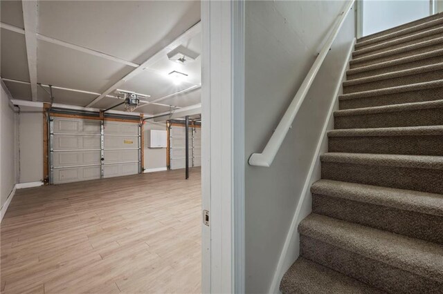 274 Sleepy Hollow Rd, Powder Springs, GA 30127 - stairway with baseboards and wood finished floors