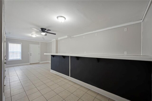 274 Sleepy Hollow Rd, Powder Springs, GA 30127 - empty room with light tile patterned floors, crown molding, baseboards, and ceiling fan