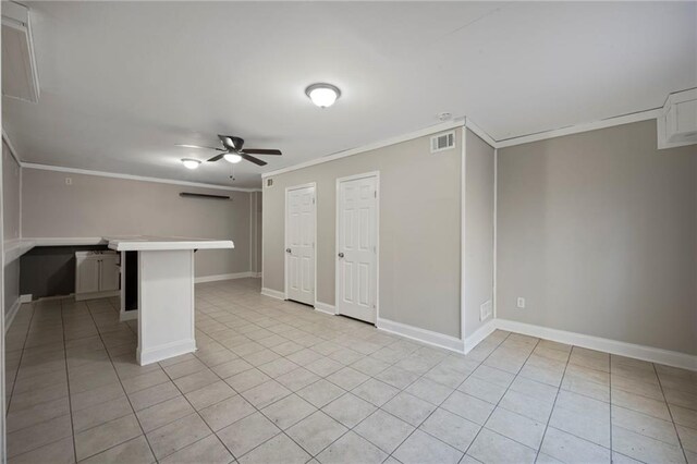 274 Sleepy Hollow Rd, Powder Springs, GA 30127 - empty room with visible vents, light tile patterned floors, ornamental molding, and a ceiling fan