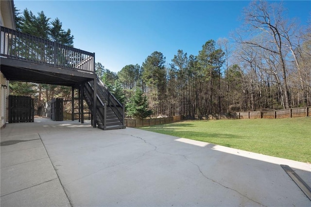 274 Sleepy Hollow Rd, Powder Springs, GA 30127 - view of patio with stairs, fence, concrete driveway, and a deck
