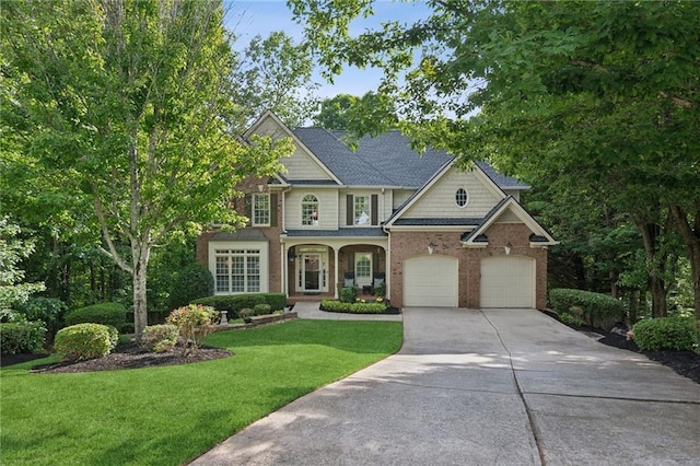 6795 Preston Glen Dr, Alpharetta, GA 30005 - view of front facade with concrete driveway, a front yard, and brick siding
