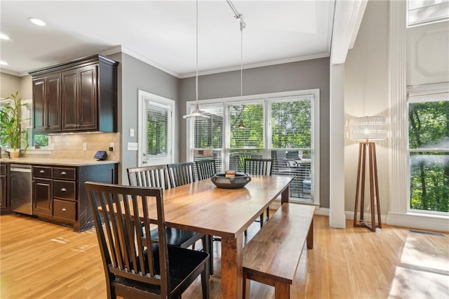 6795 Preston Glen Dr, Alpharetta, GA 30005 - dining room featuring light wood finished floors, rail lighting, healthy amount of natural light, ornamental molding, and recessed lighting