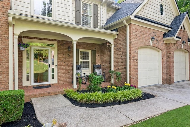 6795 Preston Glen Dr, Alpharetta, GA 30005 - entrance to property featuring concrete driveway, a porch, brick siding, and roof with shingles