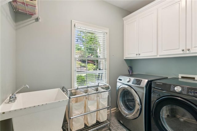 6795 Preston Glen Dr, Alpharetta, GA 30005 - laundry room featuring cabinet space and washing machine and dryer