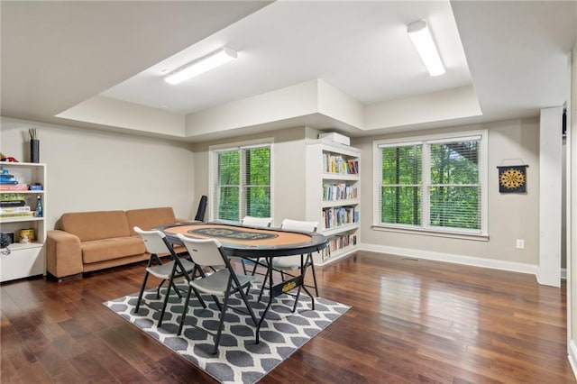 6795 Preston Glen Dr, Alpharetta, GA 30005 - dining room featuring wood finished floors, baseboards, and a raised ceiling