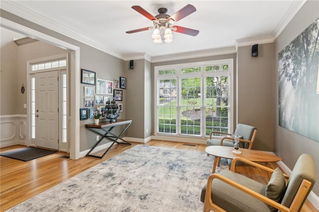 6795 Preston Glen Dr, Alpharetta, GA 30005 - sitting room with wood finished floors, a ceiling fan, and crown molding