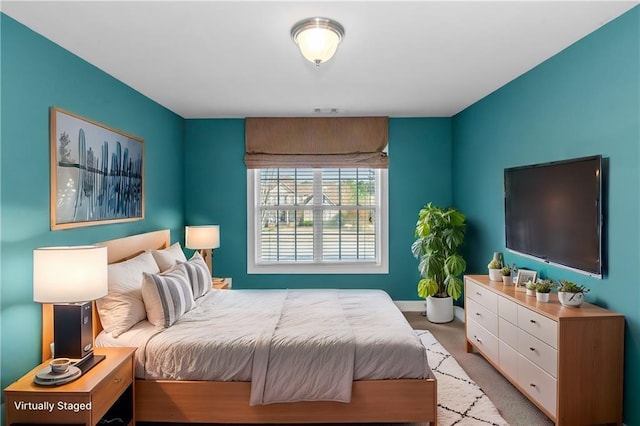 1027 Eagles Brooke Dr, Locust Grove, GA 30248 - bedroom featuring baseboards and visible vents