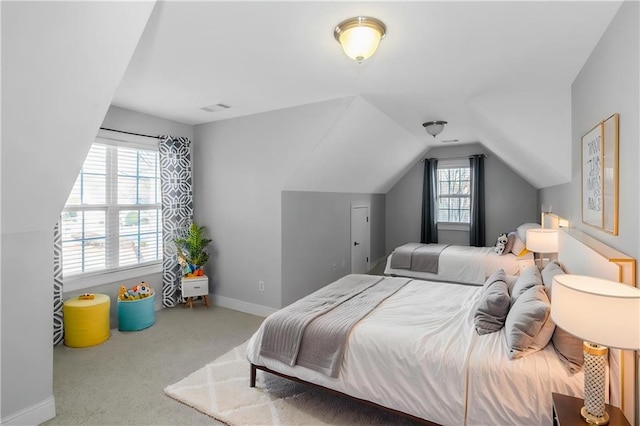 1027 Eagles Brooke Dr, Locust Grove, GA 30248 - bedroom with carpet, visible vents, lofted ceiling, and baseboards