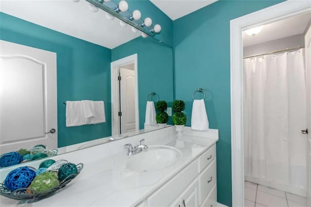 1027 Eagles Brooke Dr, Locust Grove, GA 30248 - full bath featuring tile patterned flooring, vanity, and curtained shower
