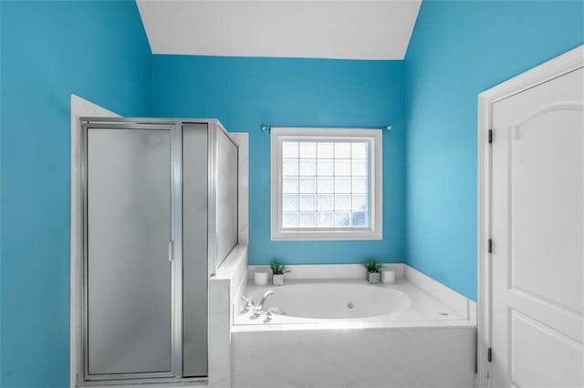 1027 Eagles Brooke Dr, Locust Grove, GA 30248 - full bathroom featuring a shower stall and a bath