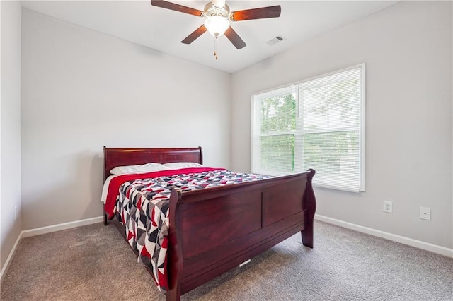 2646 Neighborhood Walk S, Villa Rica, GA 30180 - carpeted bedroom with baseboards, a ceiling fan, and visible vents