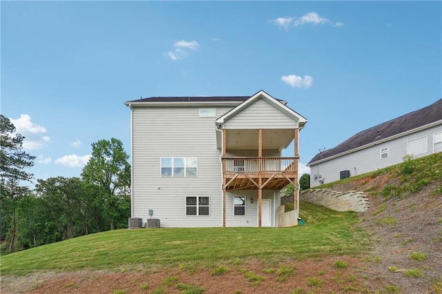 2646 Neighborhood Walk S, Villa Rica, GA 30180 - rear view of house with cooling unit, a yard, and a wooden deck
