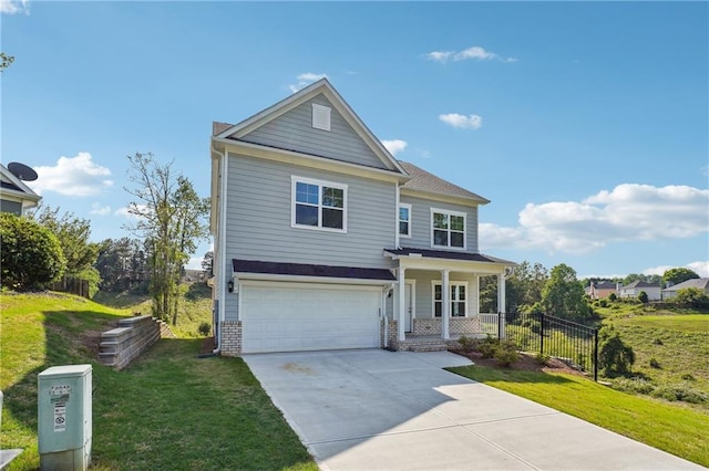 2646 Neighborhood Walk S, Villa Rica, GA 30180 - traditional home featuring covered porch, a garage, concrete driveway, a front lawn, and brick siding
