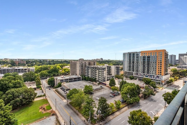 birds eye view of property with a city view