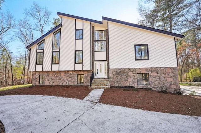 view of front facade featuring stone siding