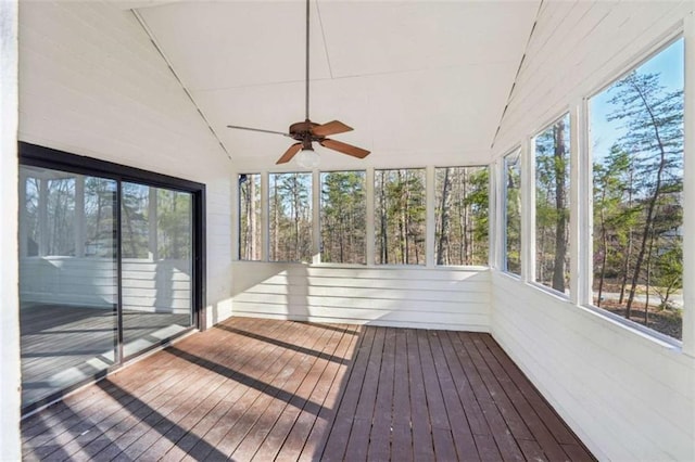 unfurnished sunroom with lofted ceiling and a healthy amount of sunlight