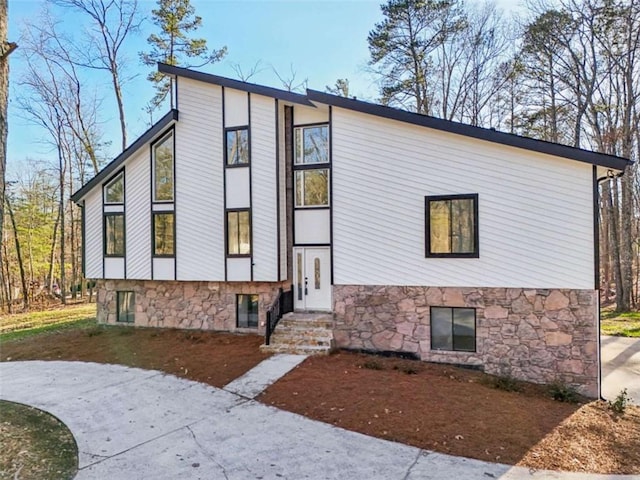 view of front of home with stone siding