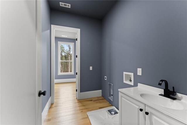 mudroom featuring light hardwood / wood-style flooring, french doors, and plenty of natural light