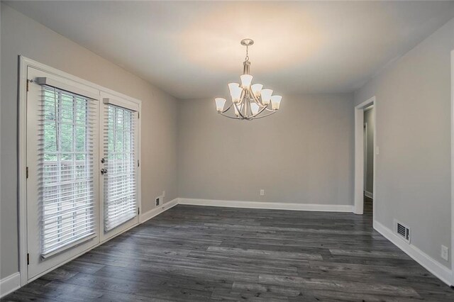 2682 Cavalier Dr, Decatur, GA 30034 - unfurnished dining area with baseboards, a chandelier, french doors, dark wood-type flooring, and visible vents